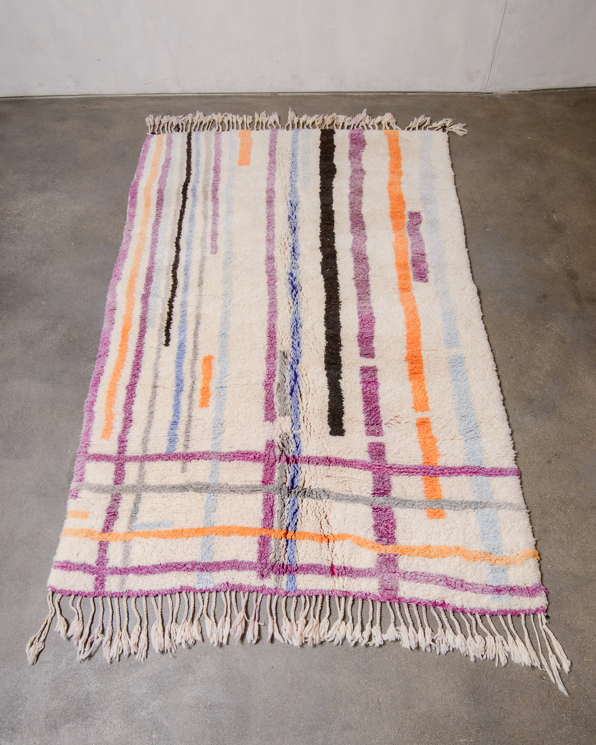 Berberlin Finest Beniourain Rug laid flat on concrete floor.